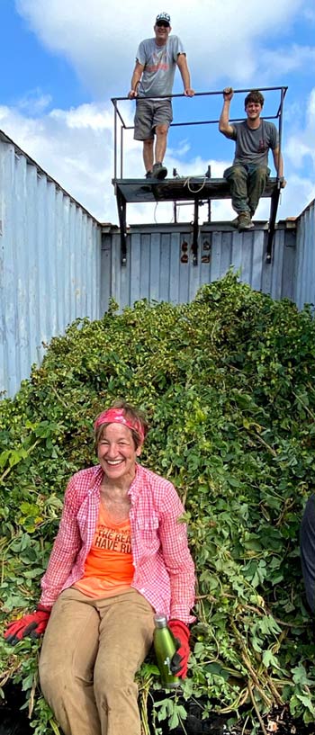 michigan hop growers with truckload full of hop harvest